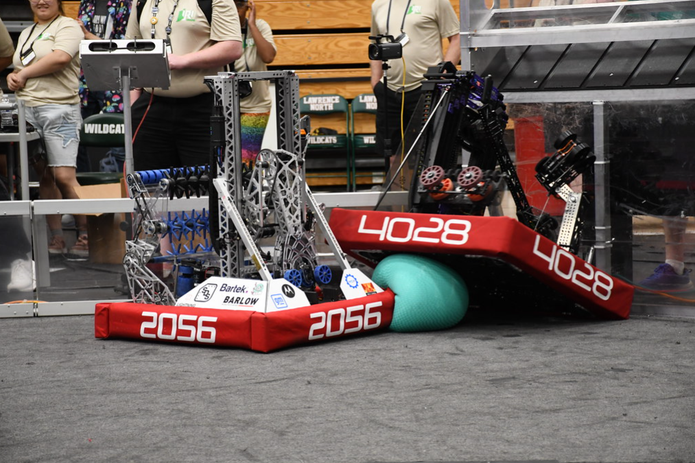 Team 2056 robot competing on a FIRST Robotics field