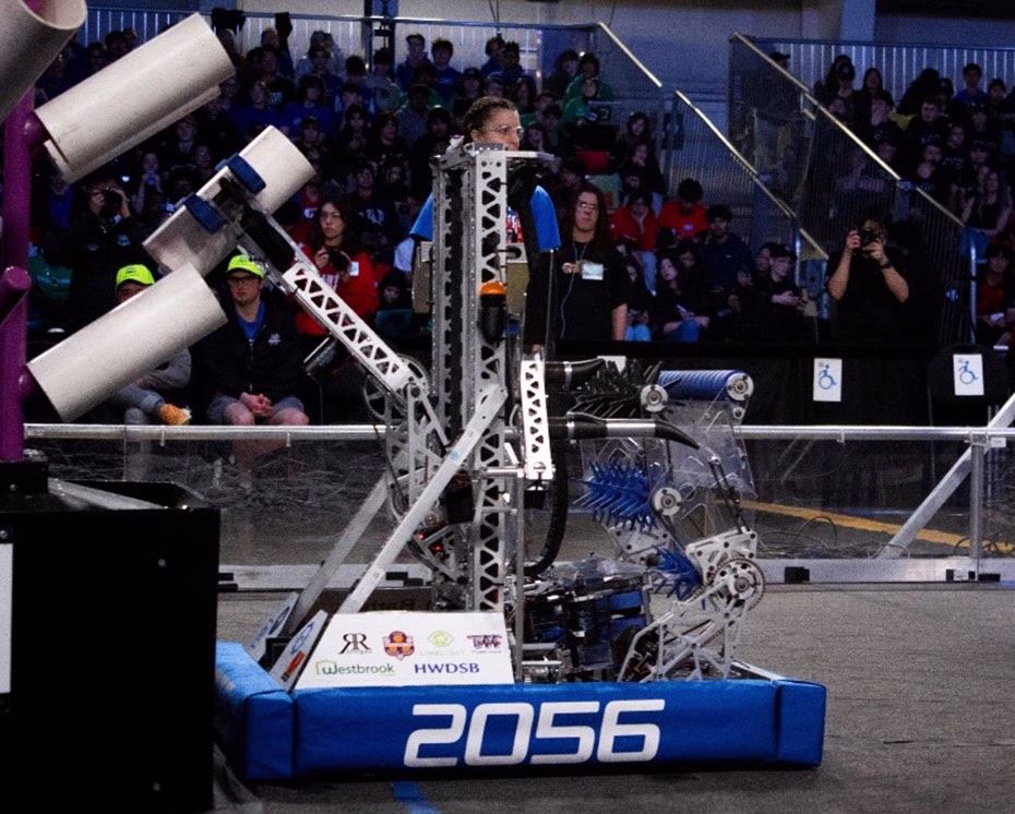 Team 2056 competition robot beside the game field during a match